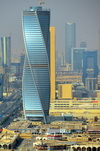 Riyadh, Saudi Arabia: the twisted Al Majdoul tower, Burj Rafal, MIG Tower and Elegance Tower to the right - view north along King Fahd Road - photo by M.Torres