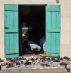 Sngal - Saint Louis: mosque du port de pche - chaussures - photographie par G.Frysinger