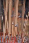 Singapore: Joss sticks outside a temple - Joss is a household deity and his cult image - incense burning (photo by S.Lovegrove / Picture Tasmania)