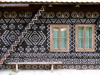 Slovakia - Cicmany village: folk architecture reserve - windows and linear wall decorations - Zilina district - photo by J.Kaman