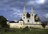 Slovakia - Spisske Podhradie, Levoca district - Presov Region: Spis Chapter with Spis castle in background - St. Martin's cathedral and walls - UNESCO World Heritage Site - Spisska Kapitula - photo by J.Fekete