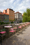empty tables along the Ljubljanica river, Ljubljana, Slovenia - photo by I.Middleton