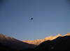 Slovenia - Kobarid - Goriska / Gorizia region: paraglider over the war cemetery - photo by R.Wallace
