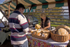 Slovenia - Jance: woman selling local produce at the Chestnut Sunday festival - photo by I.Middleton