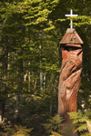 Slovenia - Kocevje - Lower Carniola / Dolenjska region: Wooden carved totem pole in the forest. - photo by I.Middleton