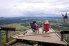 deck chairs - a couple enjoys the view towards the Kamnik Mountains - Smarna Gora mountain on the outskirts of Ljubljana, Slovenia - photo by I.Middleton