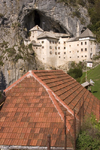 Predjama castle and red roof, Slovenia - photo by I.Middleton
