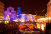 Triple Bridge reflected on the river Ljubljanica and Presernov trg - Christmas lights, Ljubljana, Slovenia - photo by I.Middleton