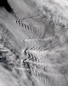 South Sandwich Island: Cloud Wakes - stratiform clouds - photo by NASA GSFC / J.Descloitres, MODIS LRRT (in P.D.)