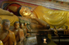 Hikkaduwa, Southern Province, Sri Lanka: Hell Temple - Reclining Buddha - statues - photo by B.Cain