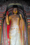 Dambulla, Central Province, Sri Lanka: standing Buddha - Dambulla cave temple - UNESCO World Heritage Site - photo by M.Torres