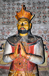 Dambulla, Central Province, Sri Lanka: statue of King Keerthi Sri wearing his crown, manthe, shirt and saravalaya - Maha Alut Vihara cave - Dambulla cave temple - UNESCO World Heritage Site - photo by M.Torres