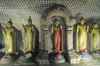 Dambulla, Sri Lanka: Dambulla Cave statues - bodhisattvas - Raja Maha Vihara - Unesco world heritage site - photo by B.Cain
