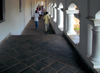 Dambulla, Central Province, Sri Lanka: walking in the colonnade - Dambulla cave temple - UNESCO World Heritage Site - photo by M.Torres