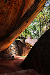 Sigiriya, Central Province, Sri Lanka: footpath under the rocks - photo by M.Torres