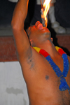 Kandy, Central province, Sri Lanka: fire eater - entertainer - Maha Nuvara - Senkadagalapura - photo by M.Torres