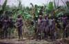 Sudan - White Nile River - Jonglei / Junqali state: tribesmen in a banana plantation by the river - photo by Craig Hayslip