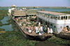 Sudan - White Nile River - Jonglei / Junqali state: collection of boats and barges that passed for a ferry - photo by Craig Hayslip