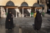 Damascus: muslim tourists photograph each other (photographer: John Wreford)