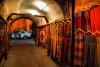 Damascus, Syria: carpets and clothes for sale - a passage at night - old town - photographer: M.Torres