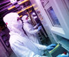Taiwan - Semiconductor manufacturing foundry - workers in a clean room - photo by Bob Henry