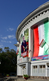 Dushanbe, Tajikistan: Soviet period clinic on Bukhoro Street - flags of Tajikistan and President Emomali Rahmon image - photo by M.Torres