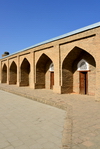 Hisor, Tajikistan: arches leading to rooms in the old Madrassa, Islamic school - photo by M.Torres