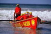 Surf lifesaving - returning (photo by Picture Tasmania/S.Lovegrove)