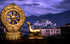 Lhasa, Tibet: Potala Palace seen from Jokhang Monastery - Dharmachakra wheel with flanking deer, the eight spokes represent the Noble Eightfold Path of Buddhism and the deer recalls Buddha's first sermon in Sarnath Deer Park - photo by Y.Xu