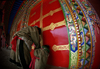 Tibet - pilgrims worshipping - temple gate - fish-eye view - photo by Y.Xu