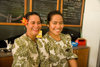 Tonga - Tongatapu - Nuku'alofa: women in exotic uniform - restaurant - photo by D.Smith
