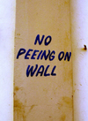 Trinidad - Port of Spain: no peeing on wall sign - photo by P.Baldwin