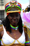 Port of Spain, Trinidad and Tobago: woman with a colorful cap in the carnival parade - photo by E.Petitalot