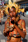 Port of Spain, Trinidad and Tobago: girl with a snake on the shoulders during the carnival - Maraval Road - photo by E.Petitalot