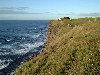 Tristan da Cunha: Runaway beach - fence on the edge (photo by Captain Peter)