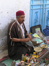 Tunisia - Douz: pharmacist in the village market (photo by J.Kaman)