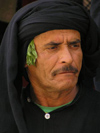 Tunisia - Tamerza: Tunisian man in black (photo by J.Kaman)