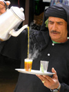 Tunisia - Tamerza: man puring tea (photo by J.Kaman)