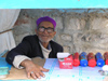 North Africa - Tunisia - Korbous: old vendor - crackers - bolachas (photo by J.Kaman)