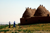 Harran, Sanli Urfa province, Southeastern Anatolia, Turkey: beehive houses - domes - Mesopotamian architecture / maisons en termitires - photo by C. le Mire