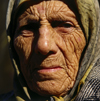 Agri province, Eastern Anatolia, Turkey: face of an old Kurdish woman with the Islamic scarf - photo by W.Allgwer