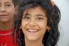 Urfa / Edessa / Sanliurfa, Southeastern Anatolia, Turkey: smiling Kurdish girl - photo by W.Allgwer