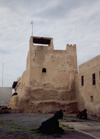 UAE - Ras al Khaimah / Ras al Khaymah / RKT : museum - watch tower of the former home of the ruling family - mud brick structure - photo by M.Torres