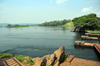 Jinja, Uganda: ruins of the old bridge to Daru at the source of the Nile river, lake Victoria on the left - photo by M.Torres