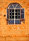 Kampala, Uganda: church window on Kikaya Hill - crude masonry wall - photo by M.Torres