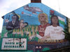 Ulster - Northern Ireland - Derry / Londonderry: anti corporate mural - Timor freedom fight against Indonesia - Fretilin Flag (photo by R.Wallace)