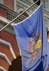 Philadelphia, Pennsylvania, USA: Flag of the Commonwealth of Pennsylvania - the state coat of arms includes a ship, a plow, and three sheaves of wheat - Pennsylvania Convention Center - Market Street - photo by M.Torres