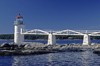 Port Clyde, Maine, USA: St. George peninsula - Marshall Point Lighthouse (1858) with white plank boardwalk serves the fishing village of Port Clyde - wooden truss - photo by C.Lovell