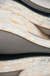 Washington, D.C., USA: National Museum of the American Indian - detail of the undulating Kasota limestone faade by Blackfoot architect Douglas Cardinal - National Mall - Smithsonian Institution - photo by M.Torres