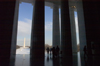 Washington, D.C., USA: Washington Memorial and the frozen Reflecting Pool seen from the interior statue of the Lincoln Memorial - fluted Doric columns - National Mall - photo by C.Lovell